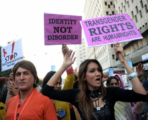 Transgender people holding cards of human rights